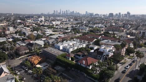 Establishing-aerial-of-Los-Angeles-neighborhood-in-East-Hollywood-with-landscape-of-downtown