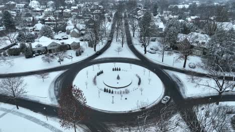 Aerial-view-of-large-traffic-circle-in-winter