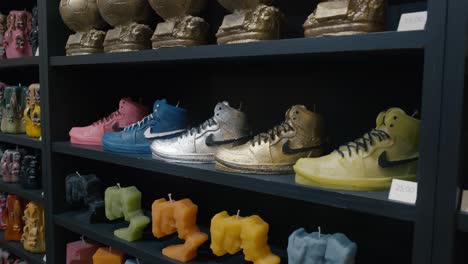 Colorful-sneaker-shaped-candles-on-display-in-Venice-La-Candela-store