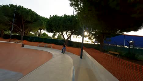 FPV-tracking-shot-of-a-BM-rider-dropping-into-a-bowl-and-doing-tricks