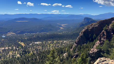 Colorado-summer-hike-bike-horse-ride-trail-Staunton-State-Park-Rocky-Mountains-Pikes-peak-Bugling-Elk-Falls-trail-Bailey-Conifer-Evergreen-sunny-blue-sky-clouds-scenic-landscape-view-slow-pan-left