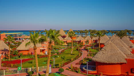 Beautiful-time-lapse-transition-from-day-to-night-in-a-beautiful-hotel-on-the-beach-with-nature-and-palms