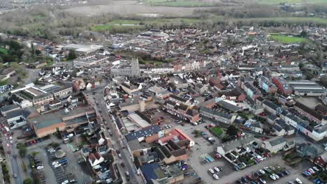 Flying-drone-shot-showing-the-town-of-Sudbury-in-Suffolk,-UK