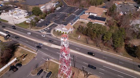 Fire-observation-tower-slow-descent,-rotation-and-backwards-movement