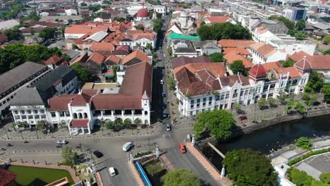 Downtown-of-Semarang-city-with-street-traffic,-aerial-drone-view