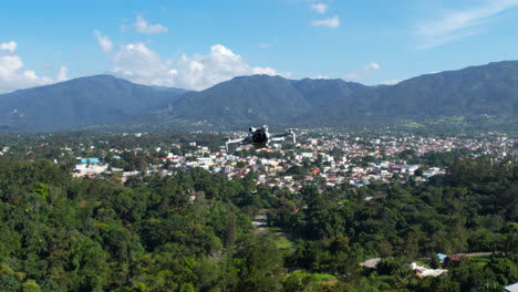 Drone-hovering-in-the-sky-during-a-windy-day,-DJI-Mini-4-Pro-flying-above-the-ground-at-a-high-altitude