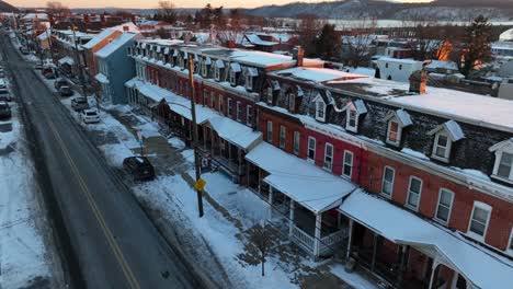 Historic-town-rowhouses-in-American-city-during-winter-with-snow