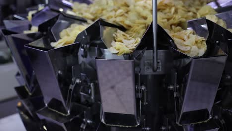 pov-shot-showing-the-chips-being-produced-inside-the-machine