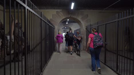 Cyclists-Carries-Bicycles-Inside-Barrage-Vauban-in-Strasbourg