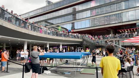 Girl-performs-tricky-jumps-at-trampoline-show-on-city-square-in-Sweden