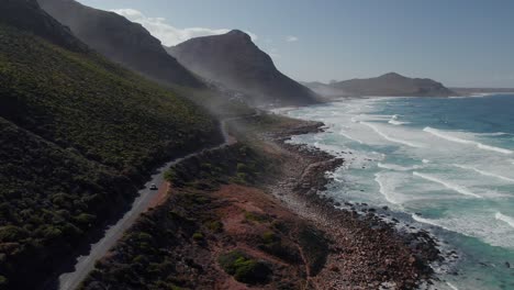 Fly-Over-Misty-Cliffs-And-Witsand-Beaches-Near-Scarborough-In-Cape-Town,-South-Africa