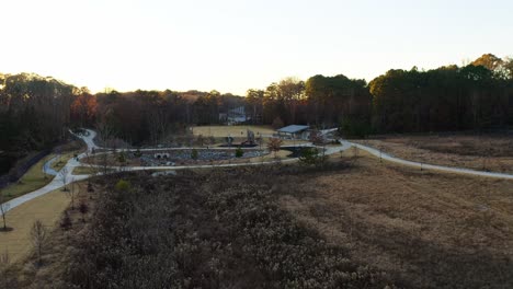 Aerial-approaching-shot-of-beautiful-West-Side-Park-in-Atlanta-at-sunset-time