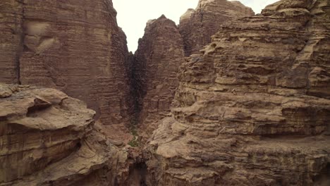 Rocky-Mountain-Cliffs-in-Middle-East-Wadi-Rum-Desert-in-Jordan,-Aerial