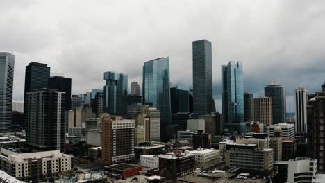 Drone-shot-pulling-away-from-Houston's-downtown-district-in-Texas