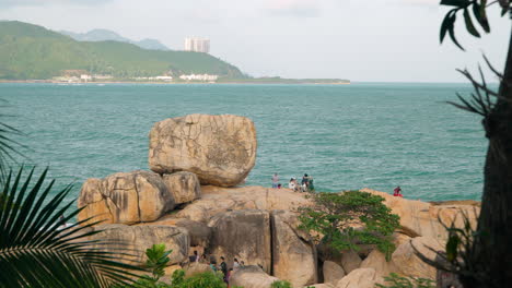 People-Travel-in-Hon-Chong-Rock-Garden-by-the-Sea,-Nha-Trang,-Vietnam