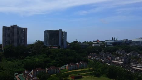Morning-side-Durban-South-Africa-on-a-hot-semi-cloudy-day-in-summer-drone-flying-pan