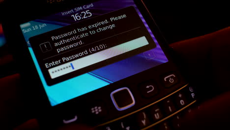 Attempting-to-unlock-a-Blackberry-device,-inputting-a-password-on-the-screen,-and-receiving-an-incorrect-password-notification