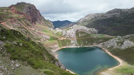 Mountain-Lake-in-Somiedo-National-Park,-Asturias,-North-Spain---Aerial-4k-Circling