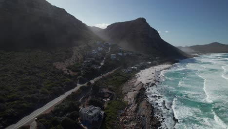 Scenic-Road,-Mountains-And-Ocean-In-Cape-Town,-South-Africa---Aerial-Pullback