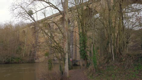 The-old-train-bridge-Viaduc-de-Clécy-in-Normandy,-France