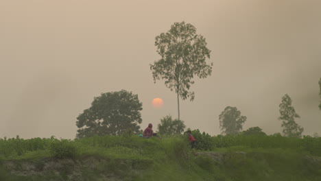 Village-child-running-towards-mother-during-sunset