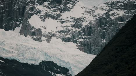 Glacier-On-The-Rocky-Mountains-Of-Patagonia-In-Argentina---Drone-Shot