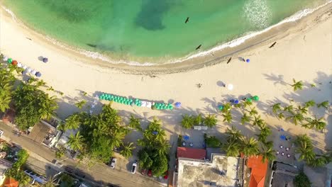 Overhead-drone-shot-showing-some-raptors-flying-above-the-Miami-Beachfront,-located-in-Central-Greece-nestled-between-the-Mediterranean-and-Ionian-Sea