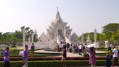 People-enjoying-famous-White-Temple-views