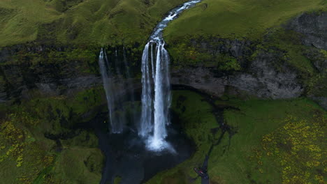 Seljalandsfoss-Waterfall-In-Seljalands-River-With-Green-Landscape-In-Iceland