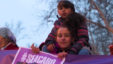 Young-protesters-are-seen-during-a-demonstration-on-International-Women's-Day