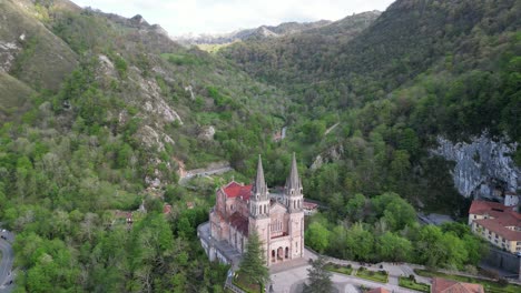 Cathedral-in-Covadonga,-Cangas-de-Onis,-Asturias,-Spain---Aerial-4k-Circling