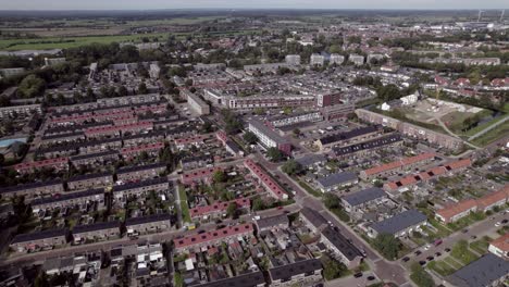 Wide-view-of-Dutch-town-revealing-shopping-area-in-residential-neighbourhood-Waterkwartier-in-suburbs-of-Zutphen,-The-Netherlands