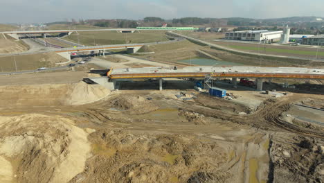 Aerial-establishing-shot-of-construction-site-of-new-Highway-road-in-Poland