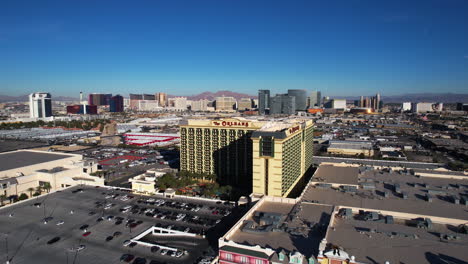 The-Orleans-Hotel-and-Casino,-Las-Vegas-NV-USA,-Drone-Shot-of-Building-With-Strip-Tower-in-Background