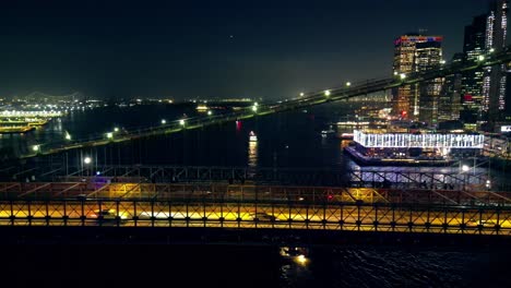 City-and-vehicle-lights,-creating-mesmerising-backdrop-from-Brooklyn-Bridge