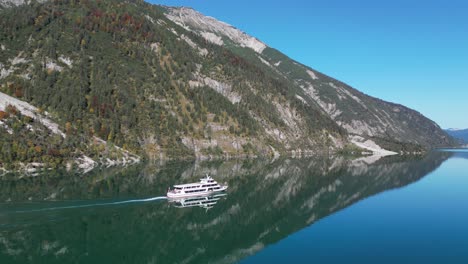 Cruise-Boat-Tour-at-Mountain-Lake-Achensee-in-Tyrol,-Austria---Aerial-4k