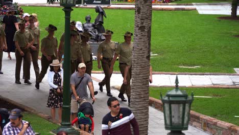 A-troop-of-Australian-defence-force-marching-down-the-path-across-Anzac-square,-getting-ready-for-the-Anzac-day-parade