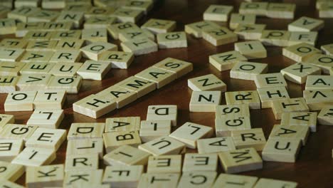 Among-assorted-Scrabble-tiles,-letters-form-words-HAMAS-and-WAR