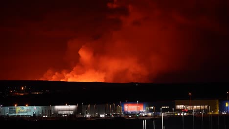 Shopping-Center-in-Iceland-and-burning-horizon-after-volcano-eruption-at-night