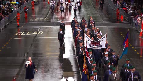 Personnels-from-British-Ex-Services-Association-marched-down-the-street-during-annual-parade-on-Anzac-day,-Brisbane-city