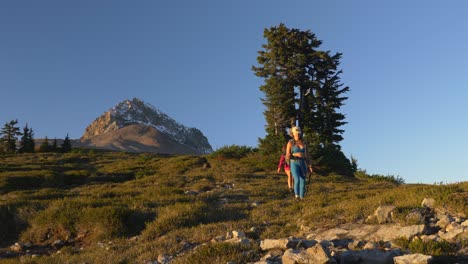 Female-Hikers-Trekking-Downhill-At-Garibaldi-Provincial-Park-In-Canada