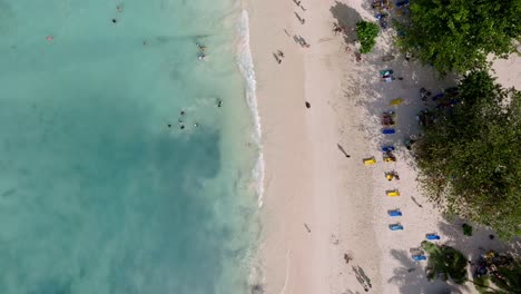 Aerial-shot-of-Beautiful-La-Playita-beach-in-Las-Galeras-on-the-Samaná,-Dominican-Republic_top-view