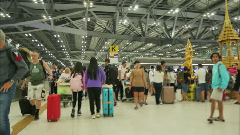 Time-lapse-moving-of-crowded-travelers-people-at-the-international-airport-check-in-counter