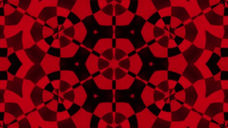 Kaleidoscope-animation:-red-and-black-rounded-shapes-,-with-a-slight-lens-flare