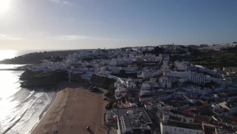 Aerial-View-Of-Albufeira-City-Beside-Empty-Beach