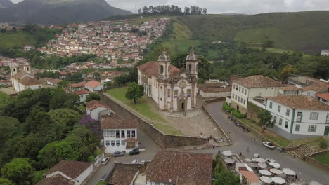 A-breathtaking-sight-of-Ouro-Preto,-a-colonial-town,-embraced-by-lush-green-mountains,-acknowledged-as-a-UNESCO-World-Heritage-Site-in-Minas-Gerais,-Brazil