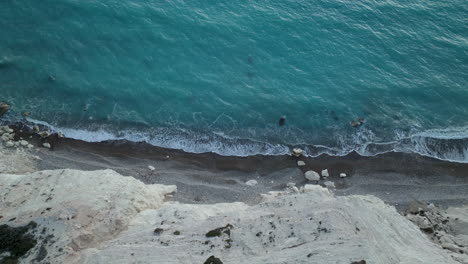 Calm-Waves-Of-Blue-Ocean-Coming-To-The-Shore-Of-Beach-In-Cyprus