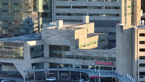 Emergency-room-signs-with-ambulances-and-helipad-at-modern-American-hospital