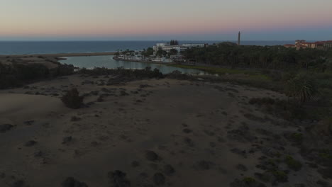 Magical-Sunrise-Over-Maspalomas-Sands-and-Nature:-Aerial-View-in-Gran-Canaria