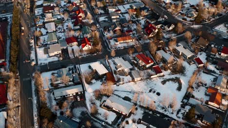 Beautiful-snowy-Icelandic-village-with-colorful-roofs-in-winter